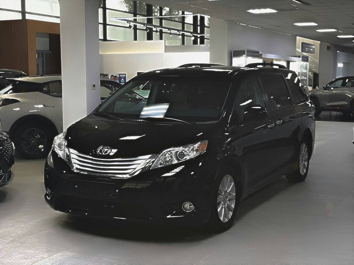 Dark-toned car showroom